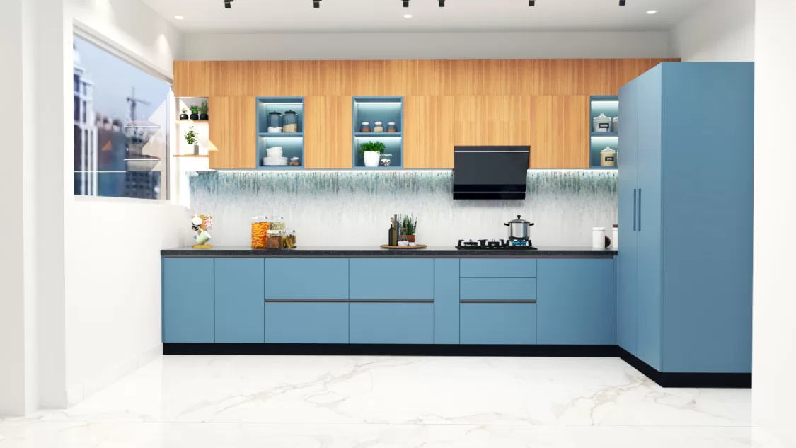 Modern modular kitchen interior design with blue cabinets and wooden overhead storage