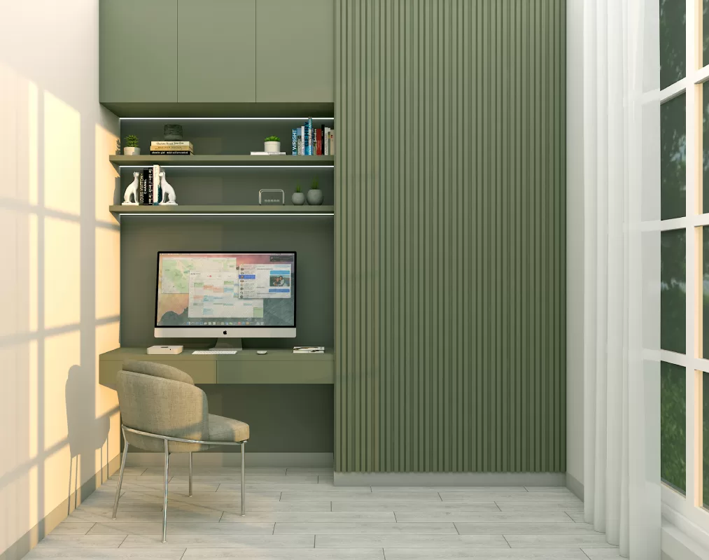 Minimalist green toned study nook with built in desk & floating shelves in bangalore