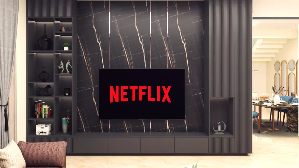 Minimalist TV feature wall with artistic shelves and black marble background