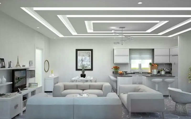 Modern open-plan living and dining area with latest false ceiling design Bangalore