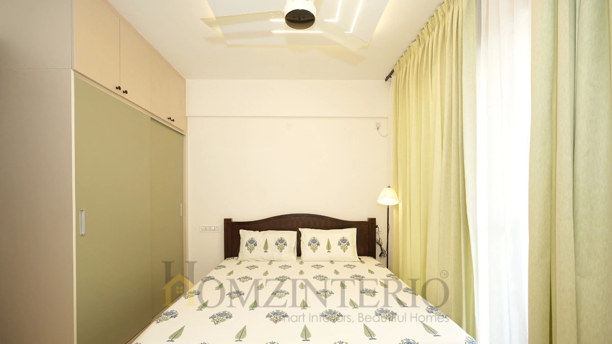 Custom Master Bedroom with Wardrobe Design in 2BHK flat at Urbannest Elite 35 Bangalore