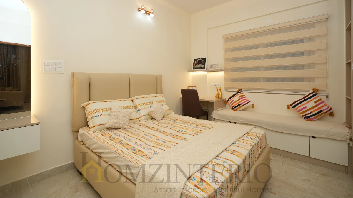 2BHK home interior design in Bangalore featuring a kids bedroom with bay window seating and study desk